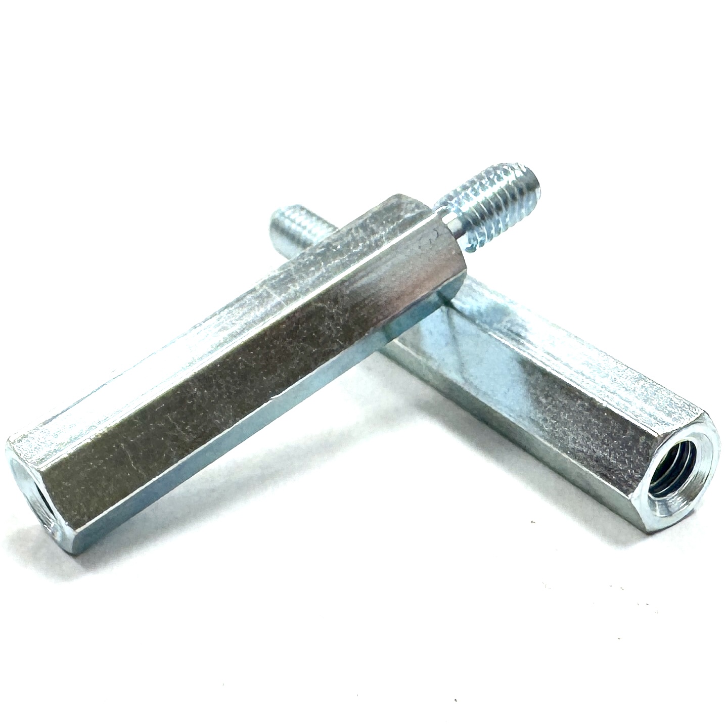 Internal-External Threaded Spacer